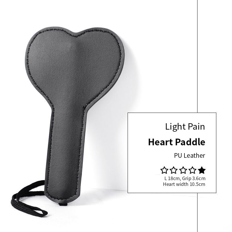 Heart Paddle in black PU leather with wrist cord